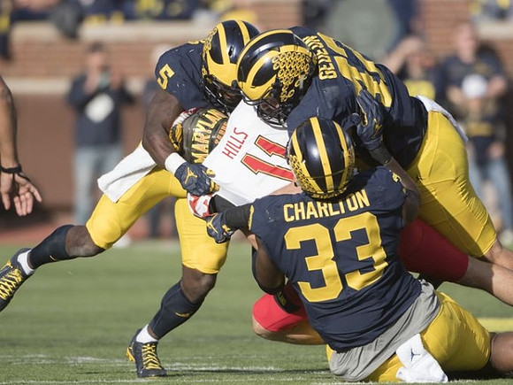 Jabrill Peppers (5), Ben Gedeon (42), and Taco Charlton (33)