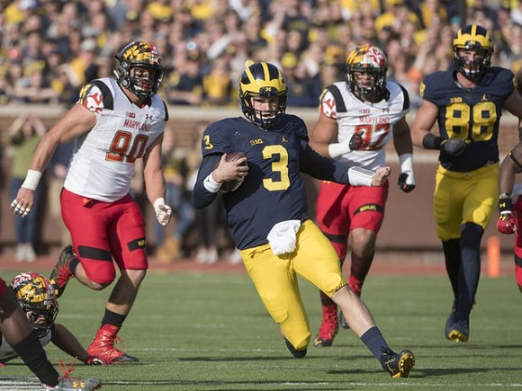 Wilton Speight (3) and Jake Butt (88)