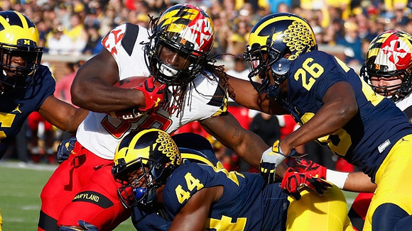 Delano Hill (44) and Jourdan Lewis (26)