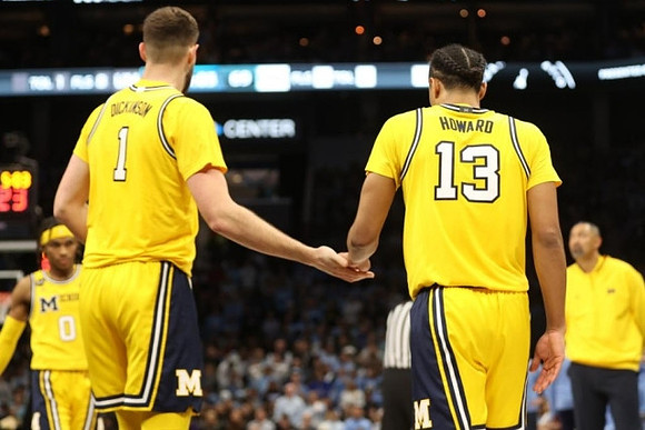 Dug McDaniel (0), Hunter Dickinson (1), Jett Howard (13), and Juwan Howard