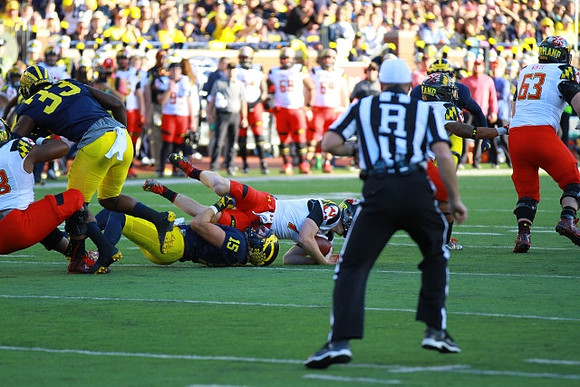 Taco Charlton (33) and Chase Winovich (15)