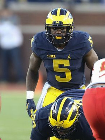 Maurice Hurst (73) and Jabrill Peppers (5)