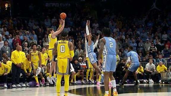 Joey Baker (15) and Dug McDaniel (0)