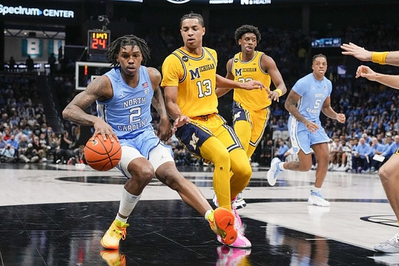 Jett Howard (13) and Tarris Reed Jr. (32)