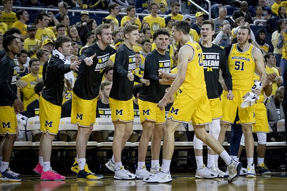 Franz Wagner (21) and Michigan Team