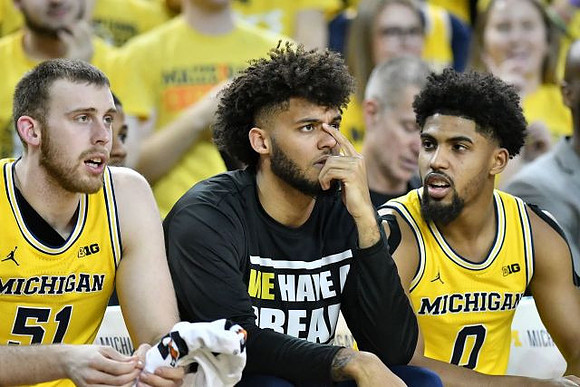 Austin Davis (51), Isaiah Livers (2), and David DeJulius (0)