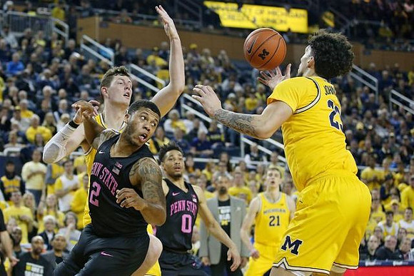 Jon Teske (15), Brandon Johns Jr. (23), and Franz Wagner (21)