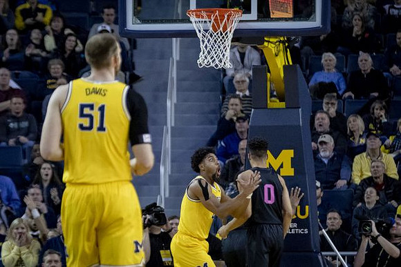 Austin Davis (51) and David DeJulius (0)