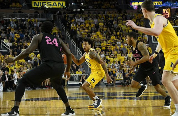 Eli Brooks (55) and Jon Teske (15)