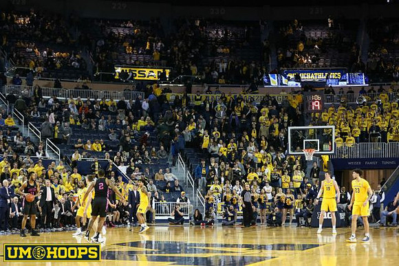 Zavier Simpson (3), Eli Brooks (55), Jon Teske (15), and Brandon Johns Jr. (23)