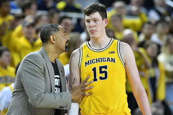 Juwan Howard and Jon Teske (15)