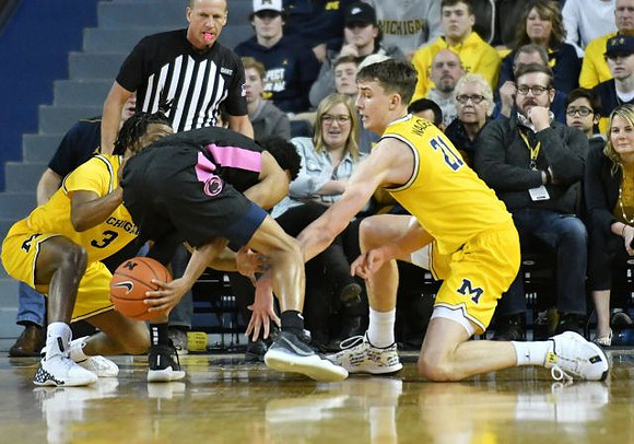 Zavier Simpson (3) and Franz Wagner (21)