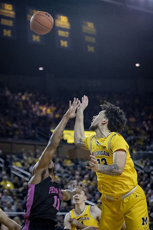 Brandon Johns Jr. (23) and Franz Wagner (21)