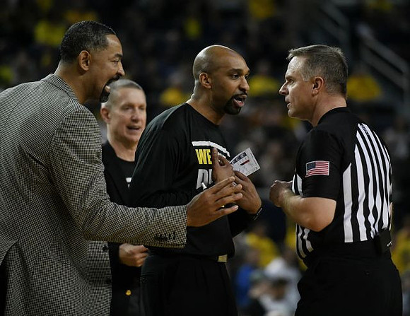 Juwan Howard and Saddi Washington