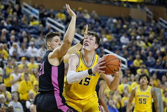 Jon Teske (15) and Eli Brooks (55)