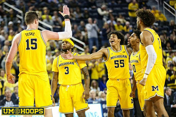 Jon Teske (15), Zavier Simpson (3), Eli Brooks (55), David DeJulius (0), and Isaiah Livers (2)