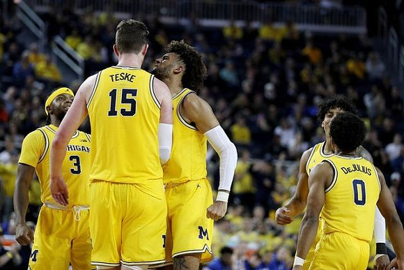 Zavier Simpson (3), Adrien Nunez (5), Isaiah Livers (2), Eli Brooks (55), and David DeJulius (0)