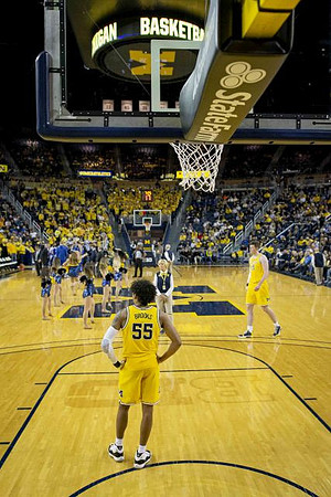 Eli Brooks (55) and Jon Teske (15)