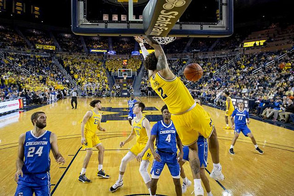 Brandon Johns Jr. (23), Colin Castleton (11), Isaiah Livers (2), and David DeJulius (0)