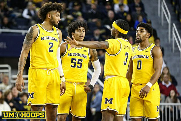 Isaiah Livers (2), Eli Brooks (55), Zavier Simpson (3), and David DeJulius (0)