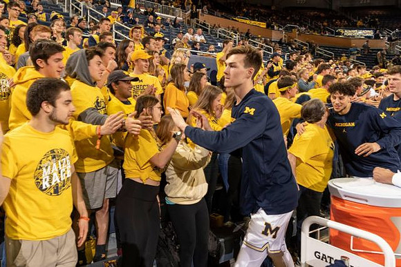 Colin Castleton (11), Brandon Johns Jr. (23), and Jon Teske (15)