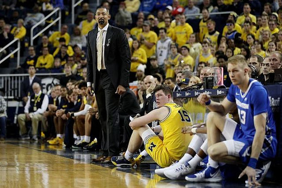 Juwan Howard and Jon Teske (15)