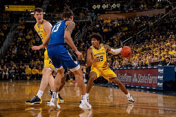 Jon Teske (15) and Eli Brooks (55)
