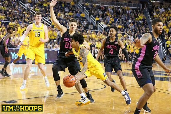Jon Teske (15) and Eli Brooks (55)