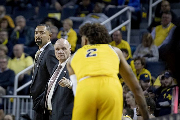 Juwan Howard, Phil Martelli, and Isaiah Livers (2)