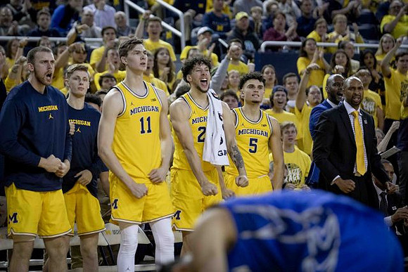 Austin Davis (51), Luke Wilson (32), Colin Castleton (11), Brandon Johns Jr. (23), Adrien Nunez (5), and Saddi Washington