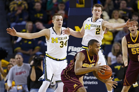 Mark Donnal (34) and Spike Albrecht (2)