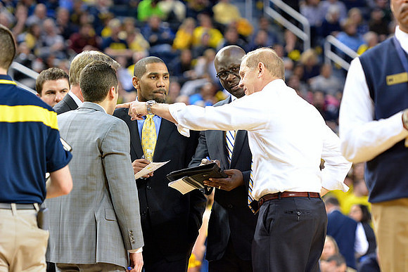 LaVall Jordan, Bacari Alexander, and John Beilein