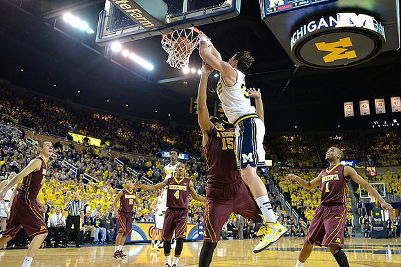 Derrick Walton Jr. (10) and Ricky Doyle (32)