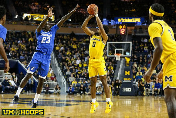 David DeJulius (0) and Zavier Simpson (3)