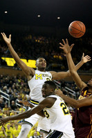 Zak Irvin (21) and Caris LeVert (23)