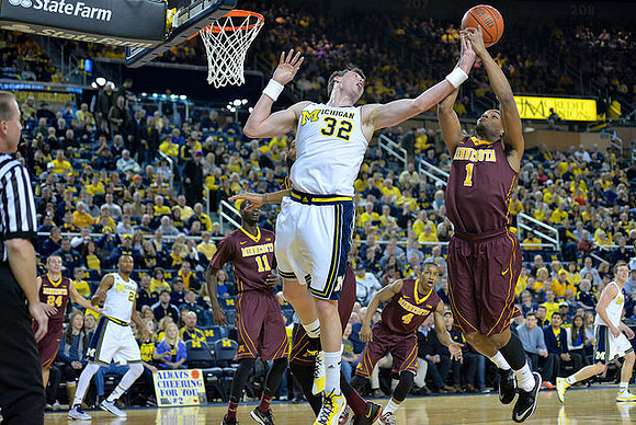 Zak Irvin (21), Ricky Doyle (32), and Spike Albrecht (2)