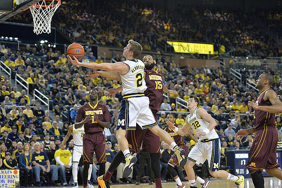 Zak Irvin (21), Spike Albrecht (2), and Ricky Doyle (32)