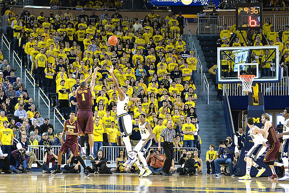 Zak Irvin (21), Aubrey Dawkins (24), Ricky Doyle (32), and Derrick Walton Jr. (10)