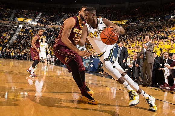 Spike Albrecht (2) and Caris LeVert (23)