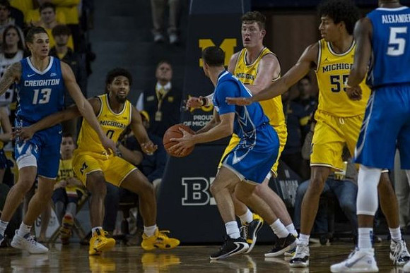 David DeJulius (0), Jon Teske (15), and Eli Brooks (55)