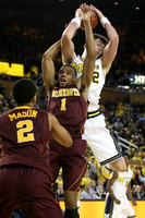 Ricky Doyle (32) and Derrick Walton Jr. (10)