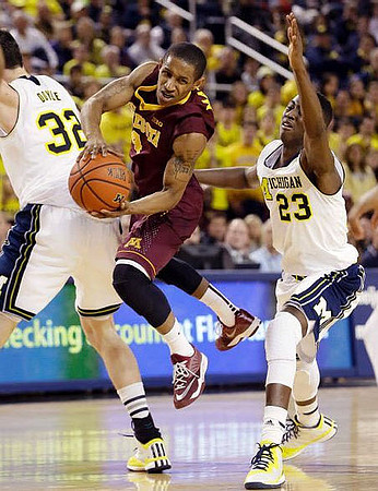 Ricky Doyle (32) and Caris LeVert (23)