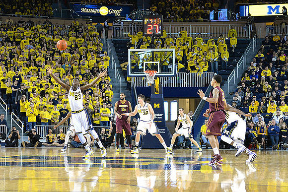 Caris LeVert (23), Ricky Doyle (32), Spike Albrecht (2), and Derrick Walton Jr. (10)