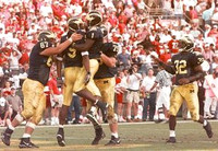 David Brandt (67), David Terrell (1), Jeff Backus (79), Anthony Thomas (32), and DiAllo Johnson (9)