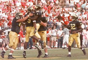 David Brandt (67), David Terrell (1), Jeff Backus (79), Anthony Thomas (32), and DiAllo Johnson (9)