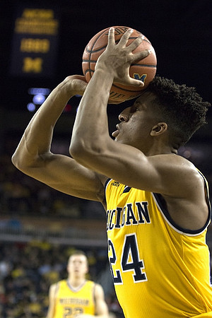 Duncan Robinson (22) and Aubrey Dawkins (24)