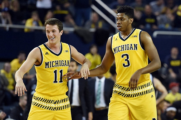 Andrew Dakich (11) and Kameron Chatman (3)