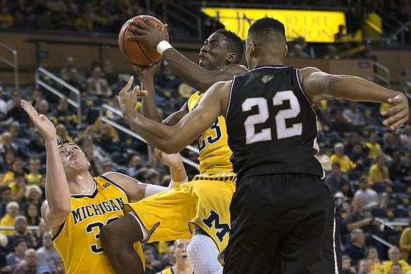 Ricky Doyle (32) and Caris LeVert (23)