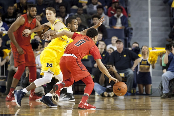 Muhammad-Ali Abdur-Rahkman (12) and Mark Donnal (34)
