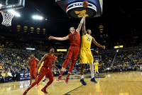 Zak Irvin (21) and Muhammad-Ali Abdur-Rahkman (12)